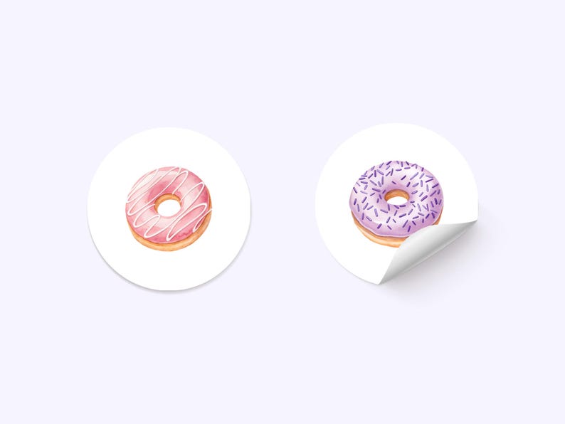 Puede incluir: Dos pegatinas redondas con im&aacute;genes de donuts. Una dona es rosa con glaseado blanco y la otra es morada con chispas moradas.