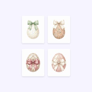 May include: Four watercolor illustrations of Easter eggs. Each egg is decorated with a bow and intricate patterns. The eggs feature pastel colors, including green, pink, and cream, and are set against a white background.