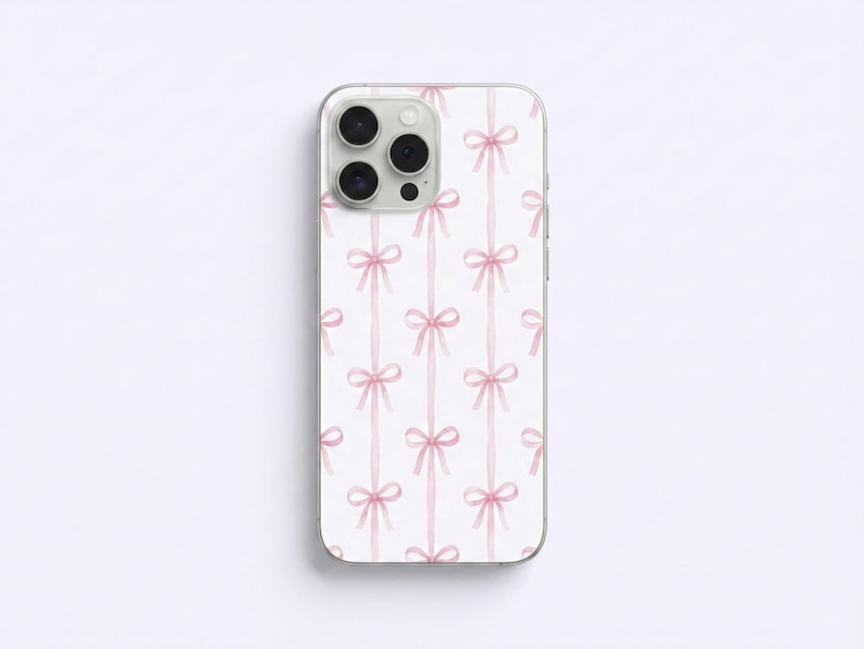 May include: A smartphone case featuring a repeating pattern of pink bows on a white backdrop. The bows are arranged vertically, creating a delicate design. The case has a clear border.