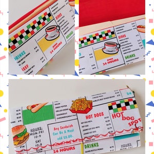 May include: A retro-style wallet featuring a diner menu design with burgers, hot dogs, and fries. The wallet has a white background with red, yellow, and green accents. The text "Open 24 Hours" is visible.