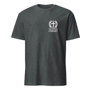 May include: A dark heather grey t-shirt with a white graphic of a shield with a cross and the text "Champions for Christ".