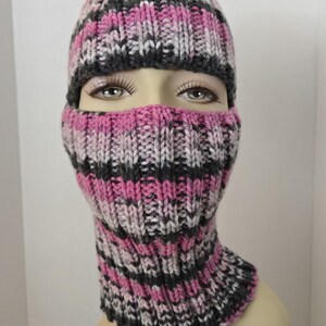 Pink and black colored ski mask