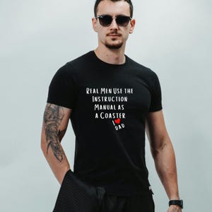 Fun Dad T-Shirt: Real Men Don’t Use Instructions - Perfect Gift for Handmade Dads