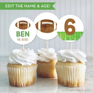 May include: Three cupcake toppers with a football theme. The toppers feature a brown football, the number 6, and the text "BEN IS SIX!" on a green background.