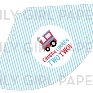 May include: A party hat with a blue and white striped pattern. A circular graphic features a red train and the text "CHUGGA CHUGGA TWO TWO!" in red and blue. The hat is designed for a child's second birthday.