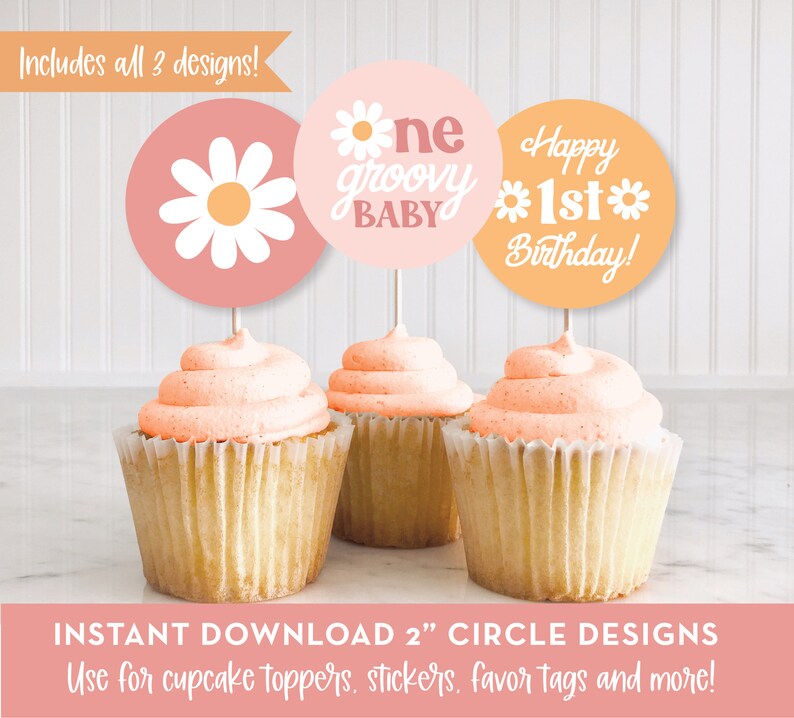 May include: Three 2 inch round printable cupcake toppers with a retro 70s theme. The first topper is pink with a white daisy. The second topper is pink with the text "one groovy baby". The third topper is orange with the text "Happy 1st Birthday!"