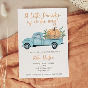 May include: A baby shower invitation with a watercolor illustration of a blue pickup truck carrying a pumpkin. The text reads "A Little Pumpkin is on the way!" and includes the name "Beth Dutton", the date "Saturday, October 24, 2020", the time "2-4pm", the address "2442 Bell Grove Drive, High Point, NC", and the RSVP information.