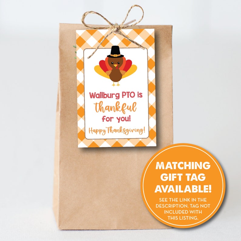 May include: A brown paper bag with a gift tag tied with twine. The gift tag has a cartoon turkey wearing a hat and the text "Wallburg PTO is thankful for you! Happy Thanksgiving!"  A separate orange circle sticker says "Matching Gift Tag Available! See the link in the description. Tag not included with this listing."