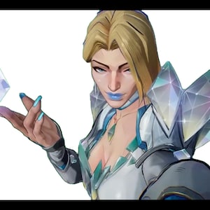 May include: A woman with blonde hair and blue eyeshadow is wearing a white and blue outfit with a crystal-like design. She is holding a translucent card with a blue and pink design.