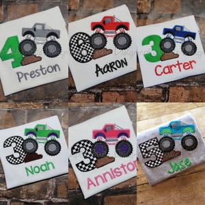 May include: Six white t-shirts with a monster truck design and a number. The trucks are different colors, including red, blue, green, and pink. The numbers are 3, 4, and 5. Each shirt has a name embroidered below the design. The names are Preston, Aaron, Carter, Noah, Annistor, and Jace.