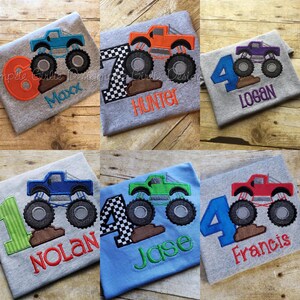 May include: Six personalized t-shirts with monster truck designs and numbers. The shirts are gray, blue, and red. The monster trucks are blue, orange, purple, green, and red. The numbers are 6, 7, 4, 1, and 4. The names on the shirts are Max, Hunter, Logan, Nolan, and Jase.