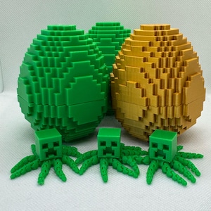 May include: Three green and gold Minecraft-themed Easter eggs with three green Minecraft Creeper figures with eight legs each.