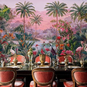 May include: A dining room set against a tropical mural. The table is set with gold-colored tableware and red velvet chairs. The mural features palm trees, birds, and lush foliage in shades of green, pink, and purple.