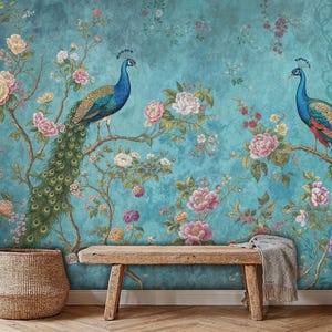 May include: A teal blue wallpaper with a floral pattern featuring peacocks. The peacocks are perched on branches with pink, white, and purple flowers.