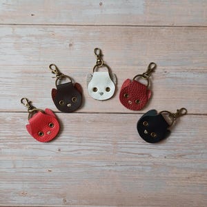 Minimalistische leren sleutelhanger in kattenvorm - Veelzijdig tasaccessoire, bedel kattentas, tas ophangen, kattensleutelhanger, eenvoudige sleutelhanger, kerstcadeau