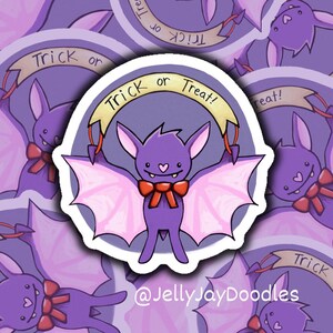 May include: A purple bat with pink wings and a red bow tie holds a banner that says "Trick or Treat!" The bat is on a purple background with a white circle around it. The text "@JellyJayDoodles" is at the bottom of the image.