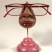 see more listings in the women's glasses stands section