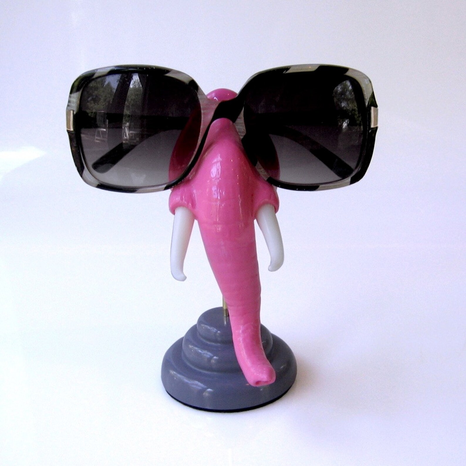 Pink elephant nose eyeglass stand Eyewear display