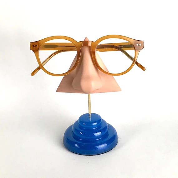 Présentoir à lunettes en forme de nez base bleue France