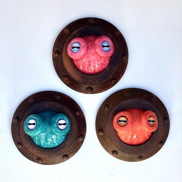 Octopus Eyes porthole sculpture, companion piece for small tentacle sculpture