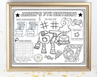 May include: A framed black and white coloring page for a 7th birthday. The page includes a word search, spot the difference, tic-tac-toe, a maze, and other game-themed illustrations. The text reads "JASON'S 7TH BIRTHDAY".