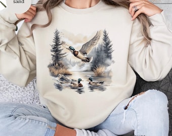 Sudadera retro de pato silvestre: escena forestal otoñal de los 90, cuello redondo unisex