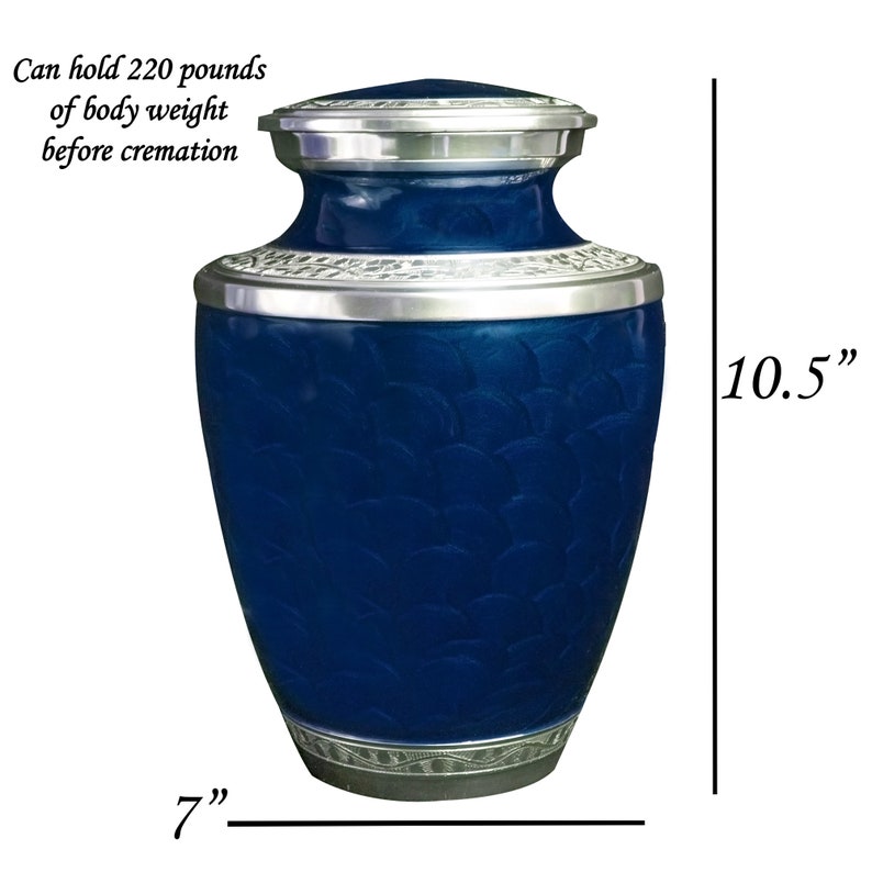 May include: Blue cremation urn with silver accents. It is 10.5 inches tall and 7 inches wide. The urn can hold 220 pounds of body weight before cremation.