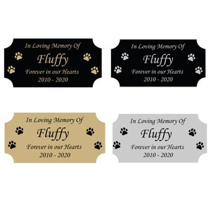 May include: Four different pet memorial plaques with the text "In Loving Memory Of Fluffy Forever in our Hearts 2010-2020". The plaques are in black, gold, silver, and gray.