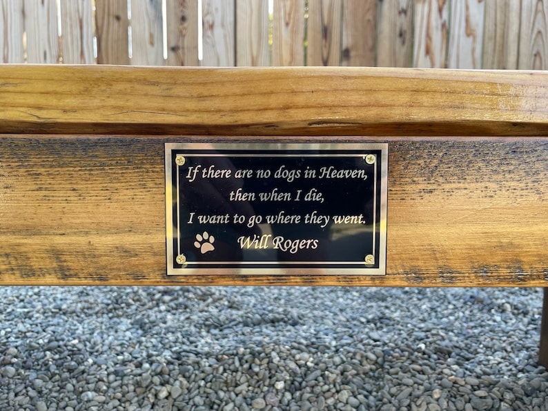 May include: A wooden bench with a brass plaque that reads "If there are no dogs in Heaven, then when I die, I want to go where they went. Will Rogers".