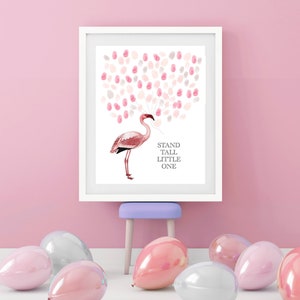 Flamingo Baby Shower Guestbook Print on display at a party