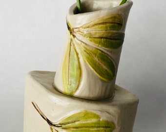 Mini lopsided vase with carved leaf