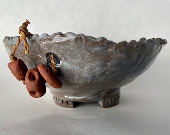 Ragged bowl, hand built with clay beads