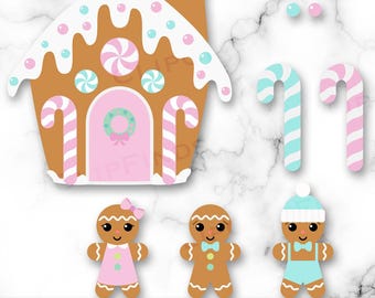 May include: A gingerbread house with pink and blue frosting, candy canes, and a wreath on the door. There are two gingerbread people, one wearing a pink dress and the other wearing blue pants. The image also includes candy canes and candy.