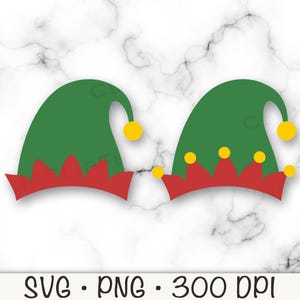 May include: Two green elf hats with red and white trim and yellow pom-poms. The hats are on a white marble background.