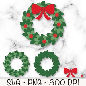 May include: Three green Christmas wreaths with red berries and a red bow. The wreaths are different sizes and are on a white marble background.