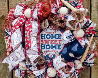 Baseball front door wreath. Baseball &quot;Home Sweet Home&quot; wreath with foam baseballs and mini bats. Baseball ribbon wreath. Red, white, blue.