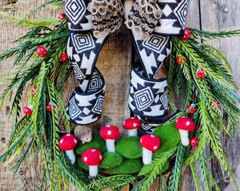 Cottage Core Mushroom wreath with sawgrass, moss rocks, handmade felt mushrooms and an adorable little hedgehog. All season wreath