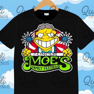 May include: Black t-shirt featuring a cartoon image of Moe Szyslak from The Simpsons. The graphic includes the text "UNCLE MOE'S FAMILY FEEDBAG" in green and white, with Moe holding sparklers. The shirt is hanging on a wooden hanger.