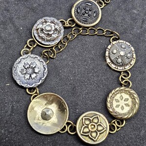 Antique Brass button bracelet with floral designs #44