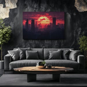 Könnte beinhalten: Ein digitaler Kunstdruck einer Stadtlandschaft bei Sonnenuntergang mit einer großen roten Sonne am Himmel. Die Gebäude sind vor dem roten und orangefarbenen Himmel silhouettiert.