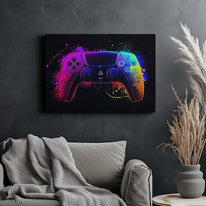 May include: A colorful, abstract design of a video game controller on a black background. The controller is a dark gray color with rainbow-colored accents and a white PlayStation logo.
