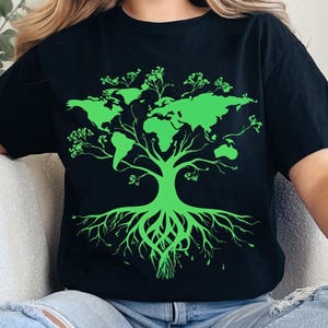 May include: Black t-shirt featuring a green graphic of a tree with the world map as its leaves and roots. The shirt is made of a soft material and is suitable for casual wear. The design promotes environmental awareness.