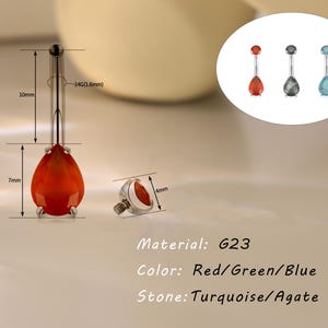 May include: A body piercing jewelry piece with a teardrop-shaped red stone, measuring 7mm in length, and a 10mm long post. The jewelry is made of G23 material and is available in red, green, and blue stone colors. The stone options are turquoise and agate.
