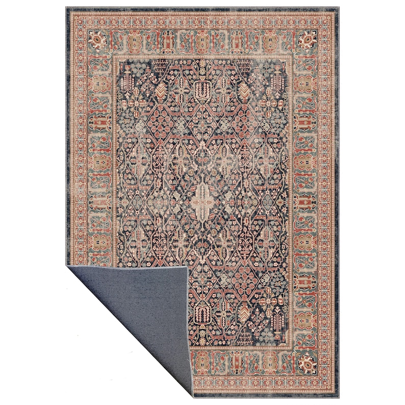 May include: A rectangular area rug with an ornate, traditional design. The rug features a dark navy blue central field with a complex floral pattern in shades of red, beige, and teal. A border in similar colors frames the design.