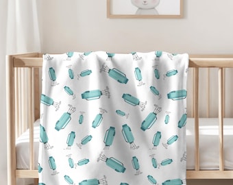 Manta y arrullo para bebé golfista. Manta transpirable y suave forro polar con detalles de bolsas de golf. ¡Artículos infantiles suaves y elegantes para futuros golfistas!