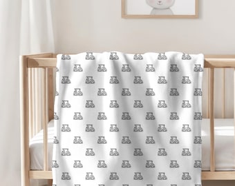 Manta y arrullo para bebé golfista. Manta transpirable y suave forro polar con diseño de carritos de golf. ¡Artículos infantiles suaves y elegantes para futuros golfistas!