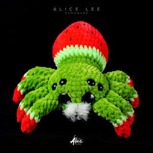 Kawaii Watermelon Spider. Features large eyes and vibrant fruit colors. Whimsical nursery decor item. Alice Lee Handmade.