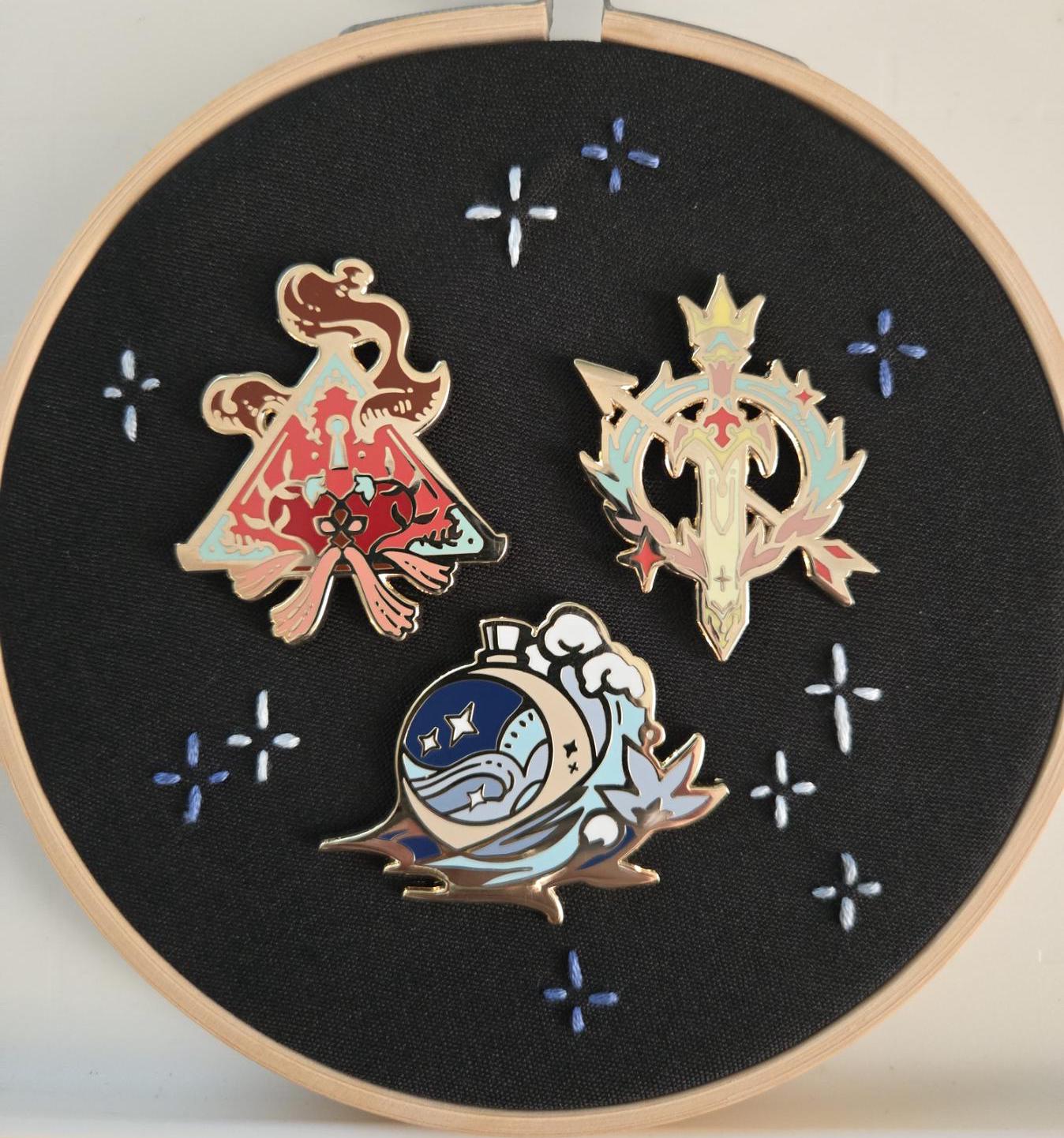 Crests of the Goddess' Enamel Pins