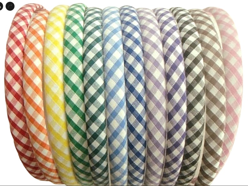 May include: A set of 12 gingham hair bands in various colors, including red, orange, yellow, green, blue, purple, brown, and pink.