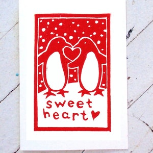 Carte imprimée à la main la Saint-Valentin de pingouin